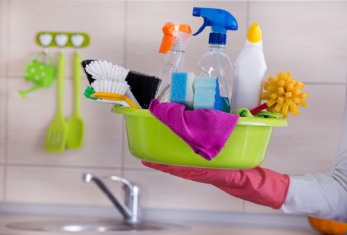 Cleaners preparing a SW10 property for move-in with detailed attention to kitchen and living areas
