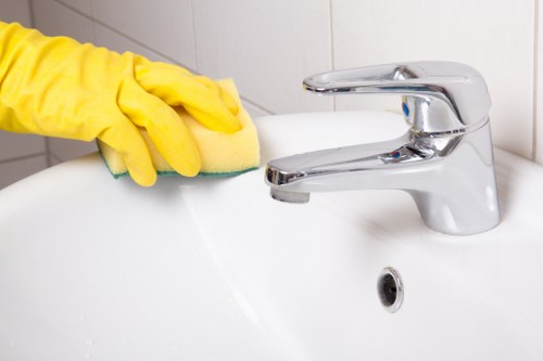 Regular cleaning service in a SW10 home with tidy living room surfaces