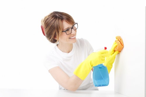 Detailed post-construction cleaning of kitchen surfaces and fixtures